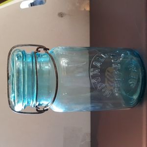 A circa 1915 McDonalds Perfect Seal blue jar.